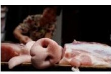 Pork prices push November inflation to 9-year high